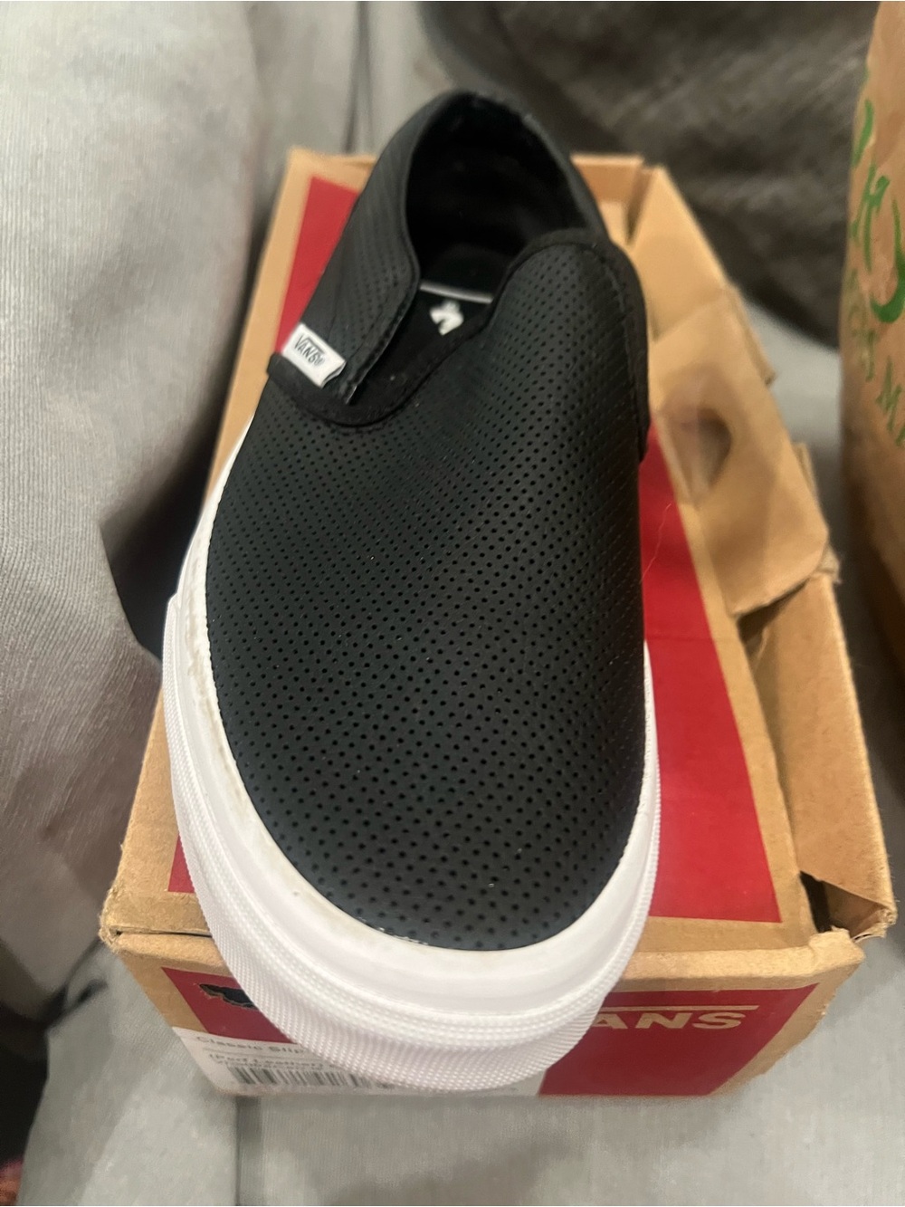 Vans Black Perforated Leather Slip-On with White Sole